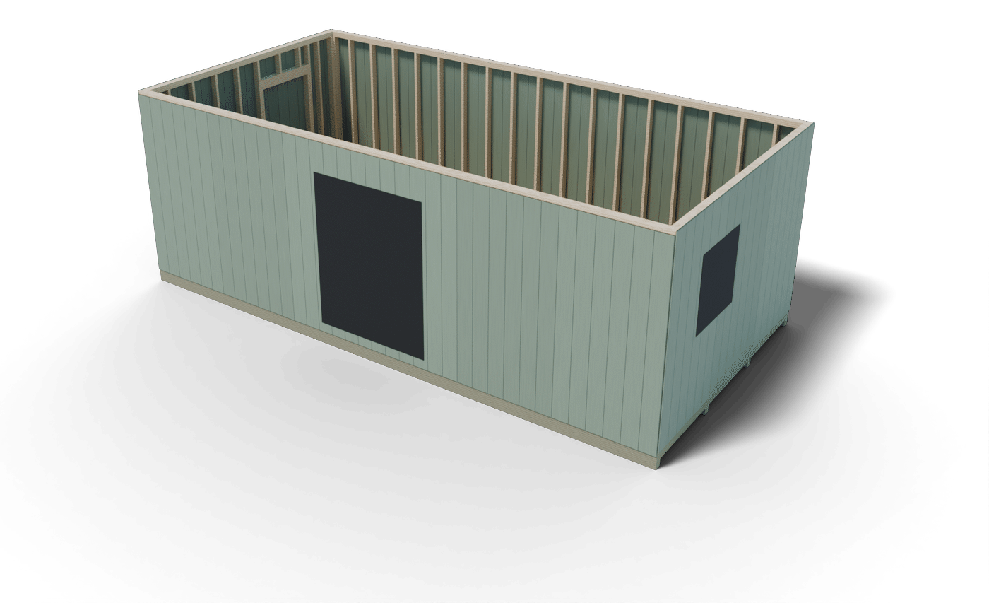 Build step: the 12x24 shed walls framed, sided with T1-11 and raised on the deck